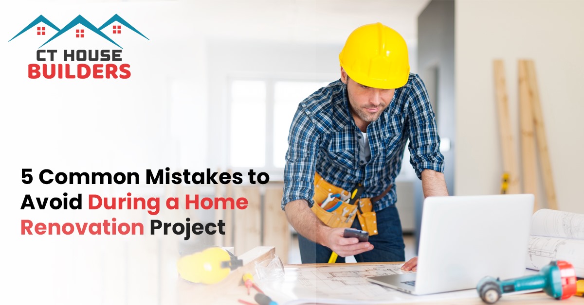 Construction worker in a yellow hard hat reviewing renovation plans on a laptop, with text on avoiding common home renovation mistakes.