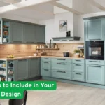 Modern kitchen with pastel green cabinets, wood backsplash, and text overlay: “Top 5 Features to Include in Your Custom Home Design