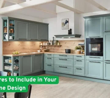 Modern kitchen with pastel green cabinets, wood backsplash, and text overlay: “Top 5 Features to Include in Your Custom Home Design
