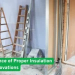 Home renovation site with ladders, drywall, and insulation materials highlighting CT House Builders’ focus on energy efficiency